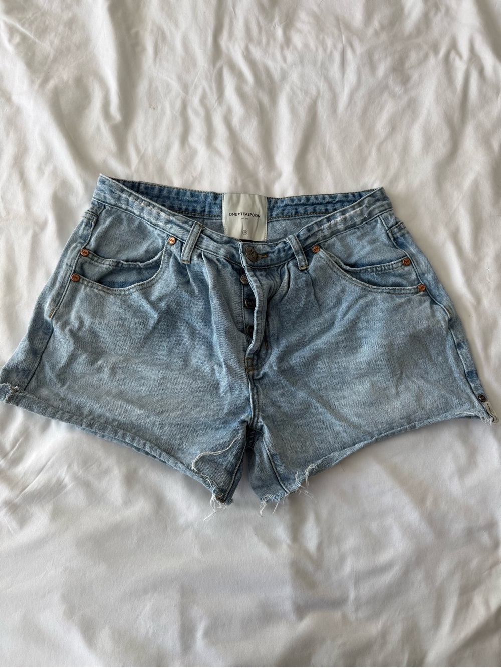 One Teaspoon faded light blue denim cutoff shorts